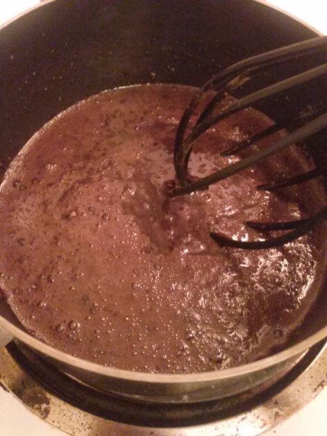 Cocoa, water, and sugar boiling. 